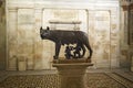 Ancient statue of Capitoline Wolf with twin brothers on display of Capitoline Museum