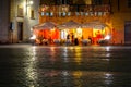 Rome, Italy - January 11, 2019: People sitting in the restaurant at Piazza Navona in Rome at night, Italy