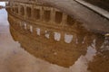 Rome, Italy, January 25th, 2019 - Reflection of the Colosseum inside a water puddle, no people Royalty Free Stock Photo