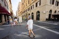 Rome, Italy - July 27, 2022: Family tourists walk in street, Rome, Italy