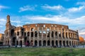 Rome, Italy - 24 June 2018: Golden sunset at the Great Roman Colosseum (Coliseum, Colosseo), also known as the Flavian Royalty Free Stock Photo