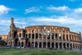 Rome, Italy - 24 June 2018: Golden sunset at the Great Roman Colosseum (Coliseum, Colosseo), also known as the Flavian Royalty Free Stock Photo