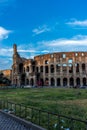 Rome, Italy - 24 June 2018: Golden sunset at the Great Roman Colosseum (Coliseum, Colosseo), also known as the Flavian Royalty Free Stock Photo