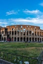 Rome, Italy - 24 June 2018: Golden sunset at the Great Roman Colosseum (Coliseum, Colosseo), also known as the Flavian Royalty Free Stock Photo
