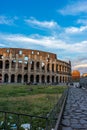 Rome, Italy - 24 June 2018: Golden sunset at the Great Roman Colosseum (Coliseum, Colosseo), also known as the Flavian Royalty Free Stock Photo