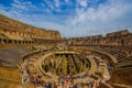 ROME, ITALY - JUNE 13, 2015: Nice summer day to visit Roman Coliseum, the new seven wonders of the modern world. Inside Royalty Free Stock Photo