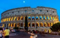 Rome, Italy - 24 June 2018: Night at the Great Roman Colosseum (Coliseum, Colosseo), also known as the Flavian Amphitheatre with Royalty Free Stock Photo