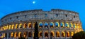 Rome, Italy - 24 June 2018: Night at the Great Roman Colosseum (Coliseum, Colosseo), also known as the Flavian Amphitheatre with Royalty Free Stock Photo