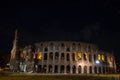 Rome, Italy - 24 June 2018: Night at the Great Roman Colosseum (Coliseum, Colosseo), also known as the Flavian Amphitheatre with Royalty Free Stock Photo