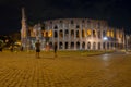 Rome, Italy - 24 June 2018: Night at the Great Roman Colosseum (Coliseum, Colosseo), also known as the Flavian Amphitheatre with Royalty Free Stock Photo