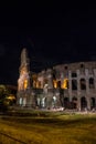 Rome, Italy - 24 June 2018: Night at the Great Roman Colosseum (Coliseum, Colosseo), also known as the Flavian Amphitheatre with Royalty Free Stock Photo