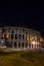 Rome, Italy - 24 June 2018: Night at the Great Roman Colosseum (Coliseum, Colosseo), also known as the Flavian Amphitheatre with Royalty Free Stock Photo