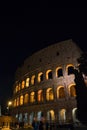Rome, Italy - 24 June 2018: Night at the Great Roman Colosseum (Coliseum, Colosseo), also known as the Flavian Amphitheatre with Royalty Free Stock Photo