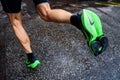 ROME, ITALY, JUNE 23. 2020: Nike running shoes ALPHAFLY NEXT%. Controversial green athletics shoe on legs of professional athlete