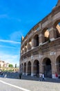 Rome, Italy - 24 June 2018: People at the entrance of the Roman Forum and the Great Roman Colosseum (Coliseum, Colosseo), also Royalty Free Stock Photo