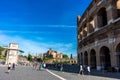 Rome, Italy - 24 June 2018: People at the entrance of the Roman Forum and the Great Roman Colosseum (Coliseum, Colosseo), also Royalty Free Stock Photo