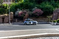 Rome, Italy - 24 June 2018: police (polizia) car at the entrance of the Great Roman Colosseum (Coliseum, Colosseo), also known as Royalty Free Stock Photo