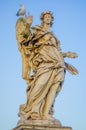 ROME, ITALY - JUNE 13, 2015: Stone sculture in Rome, female angel with wings and a big nice dress, little bird in her Royalty Free Stock Photo