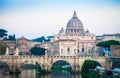 Sunset on Tiber river bridge with Vatican City - Rome, Italy Royalty Free Stock Photo