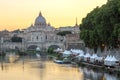 Sunset Panorama of Tiber River, St. Angelo Bridge and St. Peter`s Basilica in Rome, Italy