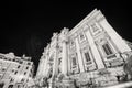 ROME, ITALY - JUNE 2014: Tourists enjoy the beautiful Trevi Fountain on a summer night Royalty Free Stock Photo