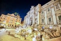 ROME, ITALY - JUNE 2014: Tourists enjoy the beautiful Trevi Fountain on a summer night Royalty Free Stock Photo