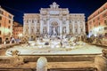 ROME, ITALY - JUNE 2014: Tourists enjoy the beautiful Trevi Fountain on a summer night Royalty Free Stock Photo