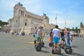 Rome, ITALY - JUNE 01: Tourists on segway in Piazza Venezia and Victor Emmanuel II Monument in Rome, Italy on June 01, 2016 Royalty Free Stock Photo