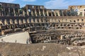 Tourists visiting inside part of Colosseum in city of Rome