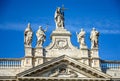 Fragment of the balustrade of the Cathedral of St. John the Baptist on the Lateran Hill in Rome Royalty Free Stock Photo