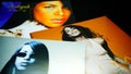 CDs and artwork of the American singer, actress, and model Aaliyah