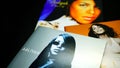 CDs and artwork of the American singer, actress, and model Aaliyah