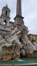 Close view details of the fountain of the four Rivers with Egyptian obelisk in Piazza Navona, Rome, Italy