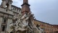 Close view details of the fountain of the four Rivers with Egyptian obelisk in Piazza Navona, Rome, Italy