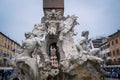 Close view details of the fountain of the four Rivers with Egyptian obelisk in Piazza Navona, Rome, Italy