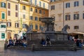 Piazza Santa Maria in Trastevere, with the fountain and the basilica.