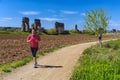 Woman runs and trains on the public park