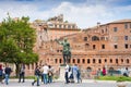 ROME, ITALY - MAY 3, 2019: Bronze statue of emperor Caesar Nervae Trajan, Forum of Caesar Nervae Trajan on the background Royalty Free Stock Photo