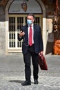 ROME,ITALY-MAY 12:Businessman in medical mask speaks at phone in Piazza della Rotonda during Italian lockdown period in Rome