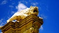 Decorative statues on the facade of the Rome zoo known as Bioparco, with the coat of arms of the municipality and the inscription