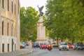 Rome, Italy - May 30, 2018: Evening streets of Rome, view on the roadway. Beautiful statue of an angel on a column at the entrance