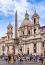 Piazza Navona square with Sant`Agnese in Agone church and Four Rivers Fountain in historic city center of Rome in Italy