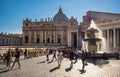 St. Peter square, Piazza San Pietro, with St. Peter Basilica and historic fountain Vatican city district of Rome in Italy