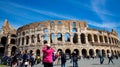 ROME-ITALY-MAY-19-2019:Tourist people take a picture by smartphone at Colosseum in Rome landmark which Rome Colosseum is one of