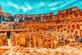 ROME, ITALY - MAY 08, 2017 : Tourist`s Inside the amphitheater of Coliseum in Rome- one of wonders of the world  in the morning Royalty Free Stock Photo