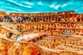 ROME, ITALY - MAY 08, 2017 : Tourists Inside The Amphitheater Of Coliseum In Rome- One Of Wonders Of The World  In The Mornin