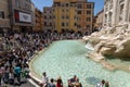 Rome Italy. May 16, 2022. Tourists visit the famous Trevi Fountain during the day to throw coins inside Royalty Free Stock Photo