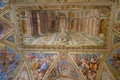 Rome, Italy - 27 Nov, 2022: Frescoes in the wall and ceiling of one of the Rafael Rooms in the Vatican Museums