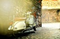 Rome, Italy - November 14, 2017: Group of Scooter Vespa parked on old street in Rome, Italy