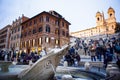 ROME ITALY - NOVEMBER 8 : large number of tourist sitting in front of spanish step fountain important traveling landmark and